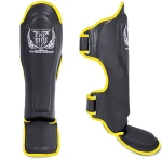 Ochraniacze piszczela i stopy TOP KING TKSGP (GL) "PRO" (black/yellow piping)
